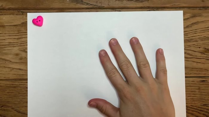 Take a desired amount of clay and warm it up to prevent cracking in the oven. Roll it into a ball.