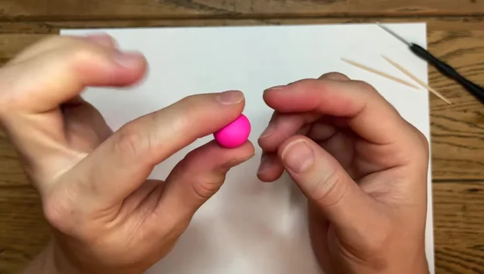 Slope the top of the heart to make it resemble a half-circle.