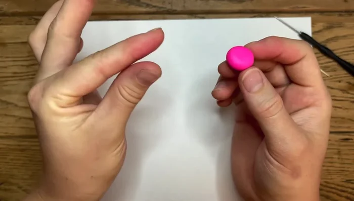 Slope the top of the heart to make it resemble a half-circle.