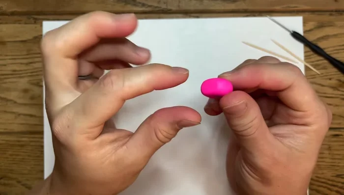 Slope the top of the heart to make it resemble a half-circle.