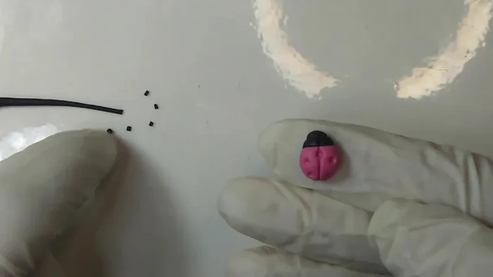 Repeat the process for the head and neck using white polymer clay.