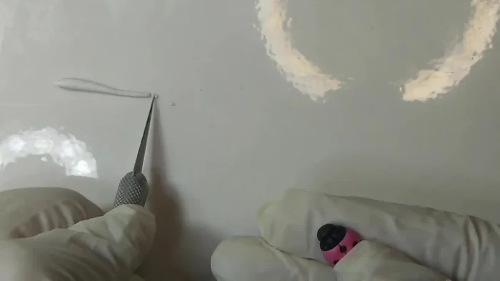 Repeat the process for the head and neck using white polymer clay.