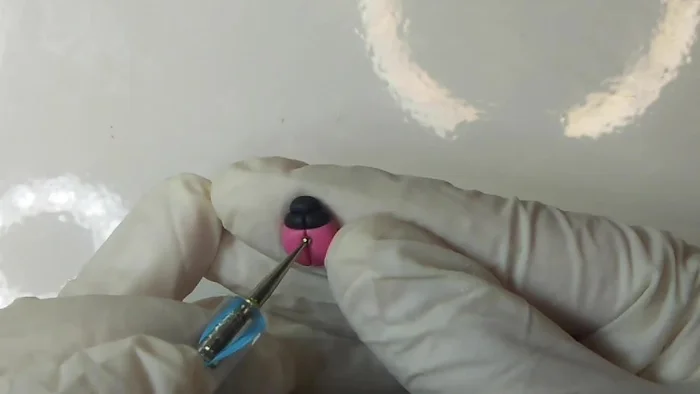 Repeat the process for the head and neck using white polymer clay.