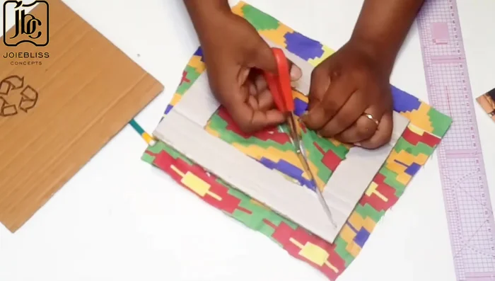 Trim excess fabric after wrapping.