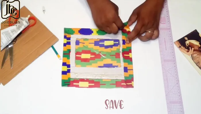 Trim excess fabric after wrapping.