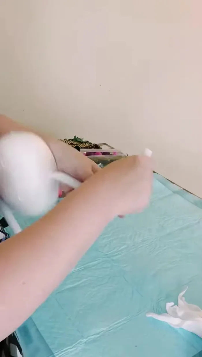 Secure the paper towel holder with hot glue (optional).