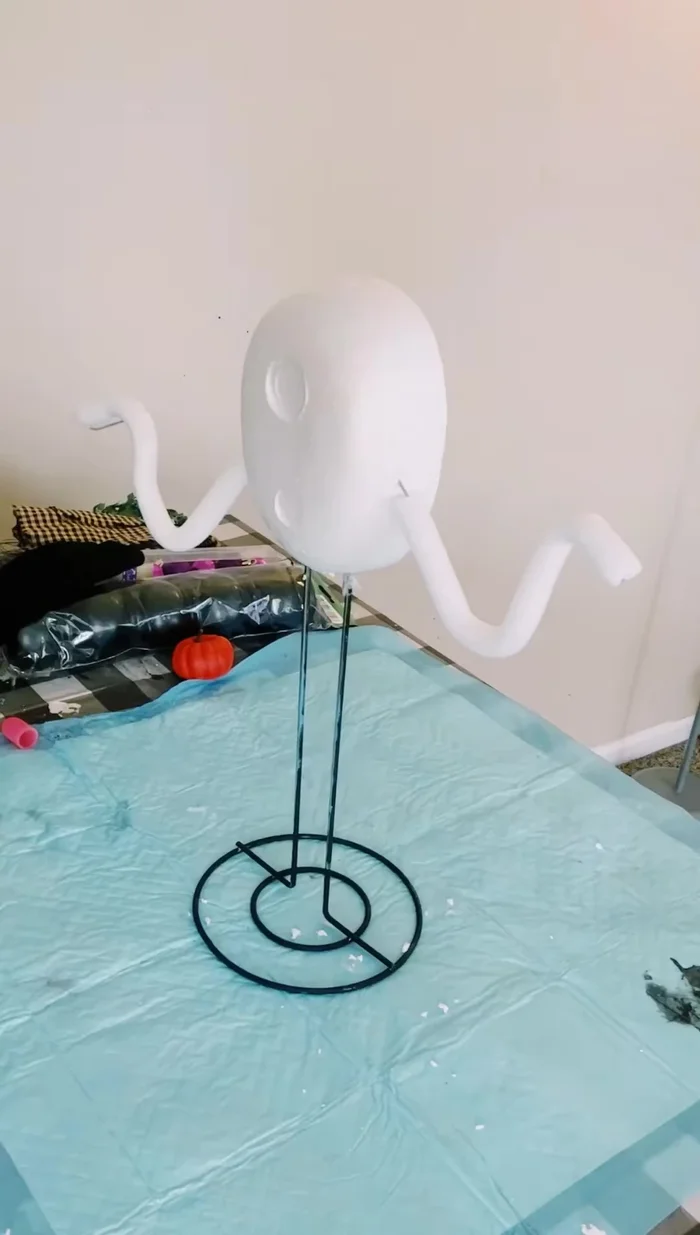 Secure the paper towel holder with hot glue (optional).