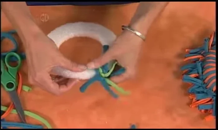 Scrunch the t-shirt loops together as you add more for a fuller, more textured look.