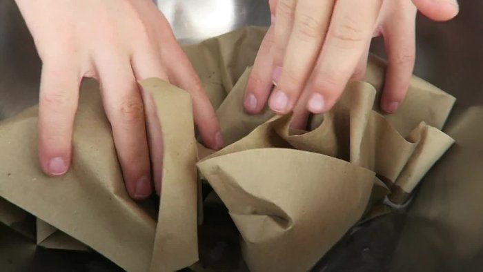 Apply hair conditioner or lotion to soften the paper and prevent crumbling.