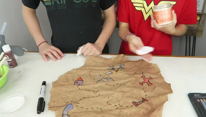 Apply hair conditioner or lotion to soften the paper and prevent crumbling.