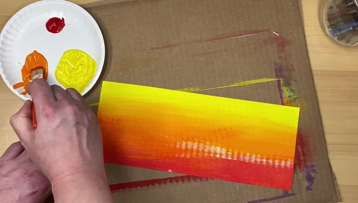 Finish by adding more of the lighter/medium colors to blend the edges and cover any remaining white space. Blend the transitions between the colors until smooth.