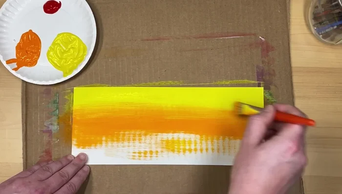 Blend the edges where the colors meet to soften the transitions. Use a bit of the lighter color to blend into the darker one.