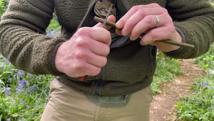 Gently twist and crack the bark off, using a knife tap to loosen if needed.