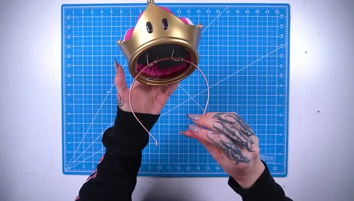 Attach the crown to a headband using aluminum wire.
