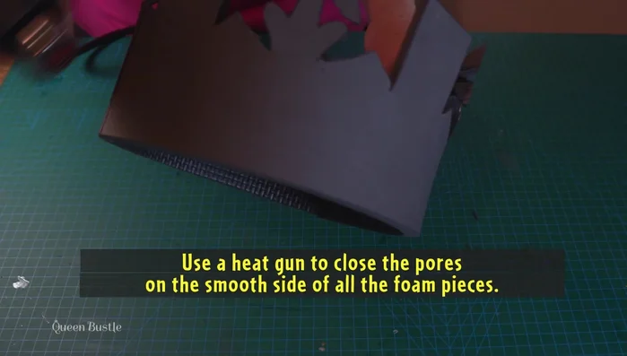 Glue together the pointed and flat ends of the pentagons to the crown base.