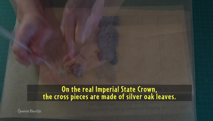 Paint the cross pieces silver or chrome.