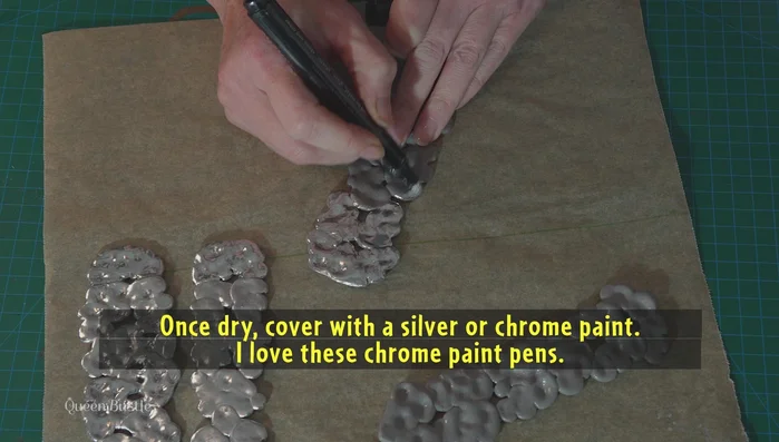 Paint the cross pieces silver or chrome.