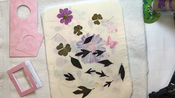 Prepare your workspace: Place a towel on your table (or use an ironing board). Cover with parchment paper to protect the surface.