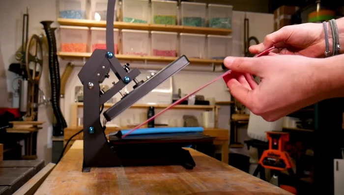 Create backing: Trim a thin sheet of pink plastic (from t-shirt press) or repurpose an old frame's back to fit the groove.