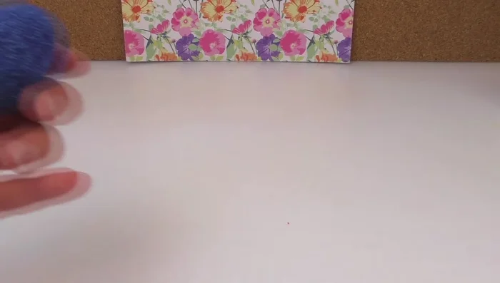 Twist the straw to create a hole for hanging.