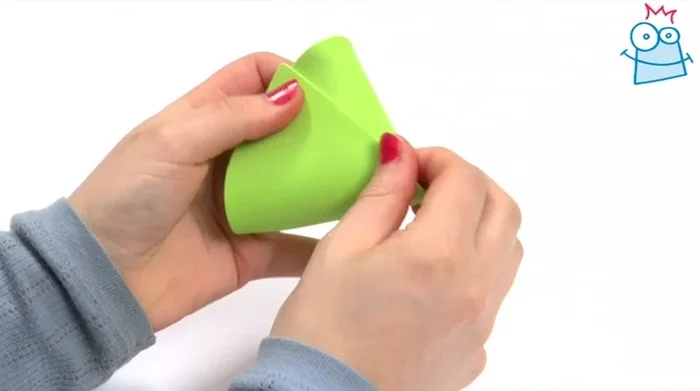 Attach the cone to the top of the rocket with glue.