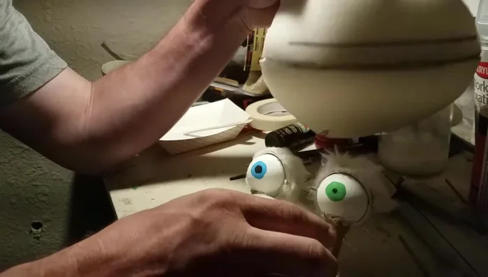 Glue the top part of the mouth into place.