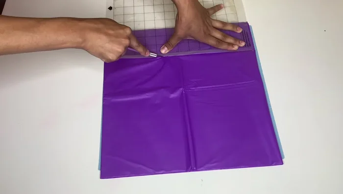 Cut the strings: Measure and cut 3-inch strips from the tablecloth. You'll need four pieces for each string, plus additional for adjustments.