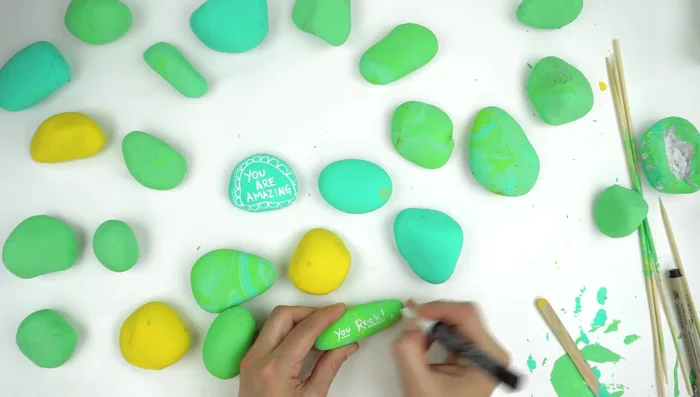 Add decorations (optional): Add decorative elements such as dots around the edges for a whimsical touch.