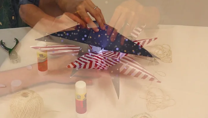 Hold both star halves together to find matching points, apply glue to those points, press together, and hold until dry (at least one hour).