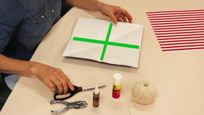 Make 2.5-inch cuts along horizontal folds (not diagonal), about halfway to the center.