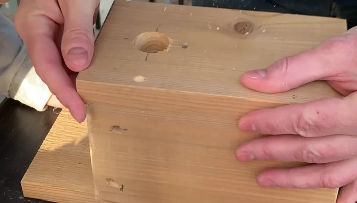 Assemble the birdhouse using screws and a drill driver.