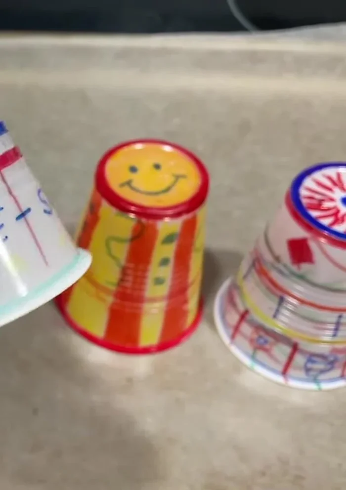 Design the 5 oz plastic cups. Decorate both the inside and outside for a complete design.
