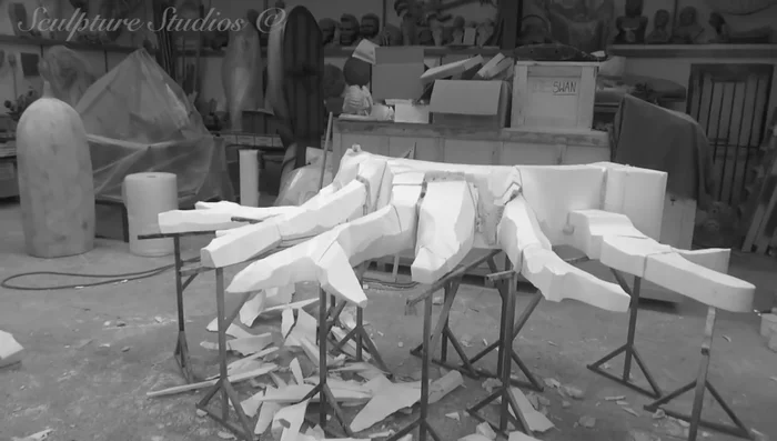 Standing up the sculpture and sending photographs to the client for approval.