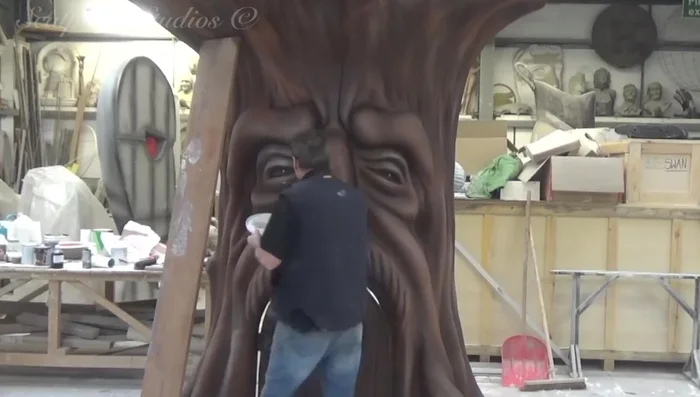 Applying a semi-sheen lacquer finish.