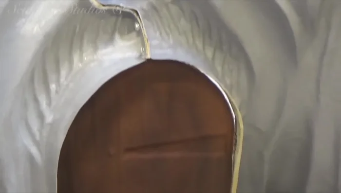 Applying a semi-sheen lacquer finish.