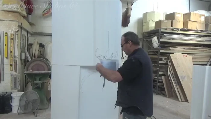 Standing up the sculpture and sending photographs to the client for approval.