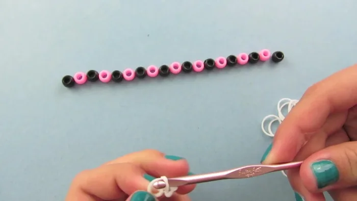 Remove one loop from the hook, leaving one loop on the hook and one on the C clip.