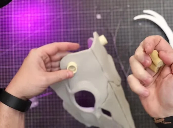 Insert wooden dowels into the PVC coupler to make antlers removable. Secure with super glue.