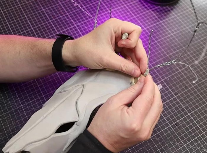 Add small strips of foam, and then use foam clay to bulk out and smooth the antler bases.