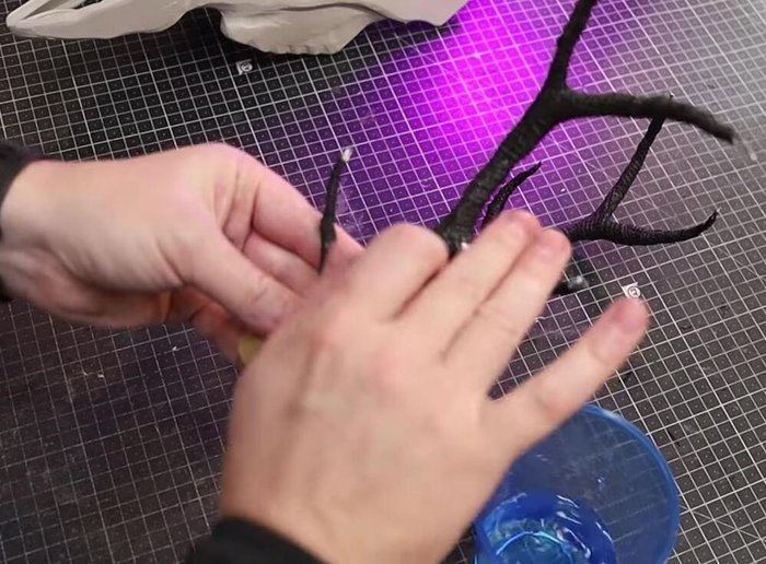 Add small strips of foam, and then use foam clay to bulk out and smooth the antler bases.