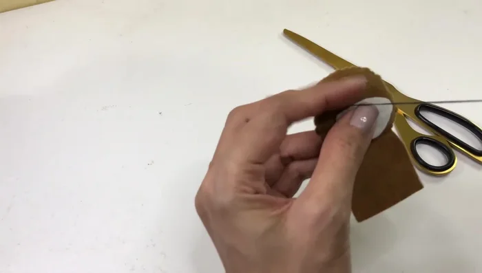 Sew on beads for the eyes.