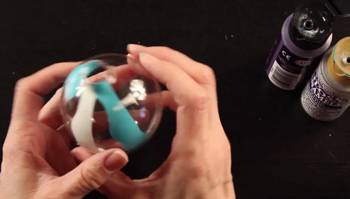 Continue adding paint, paying attention to color placement. Consider the order and proximity of colors to create desired effects (e.g., placing lighter colors between complementary colors to prevent them from muddying).