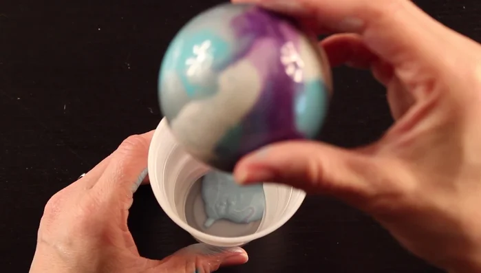 Once drained, place the ornament right-side up to dry completely.