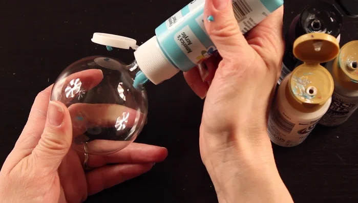 Continue adding paint, paying attention to color placement. Consider the order and proximity of colors to create desired effects (e.g., placing lighter colors between complementary colors to prevent them from muddying).