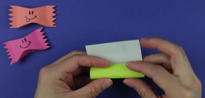 Roll and shape: Roll up the paper to your desired candy thickness. Secure with tape.