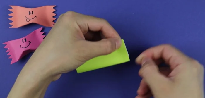 Flatten and seal: Flatten one side of the rolled paper. Use tape to close the opening, pinch to secure.