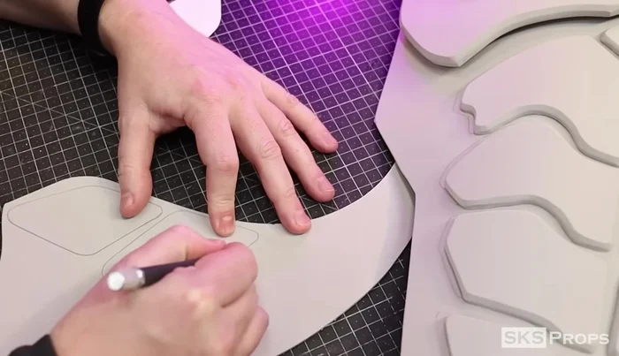 Cut Part L (side details) from 4mm foam. Glue to Parts J and K while curved to maintain shape.