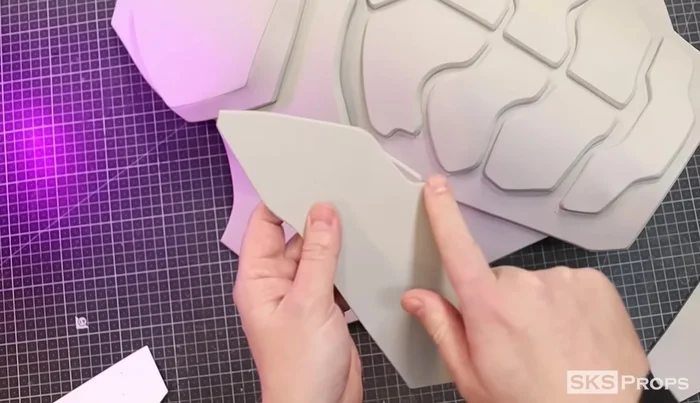 Cut Part L (side details) from 4mm foam. Glue to Parts J and K while curved to maintain shape.