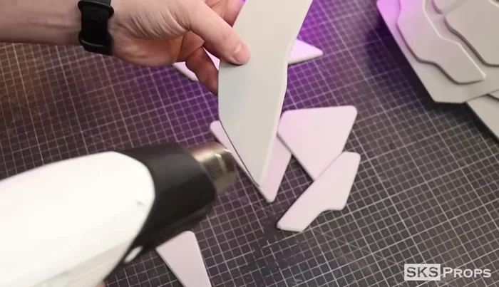 Cut Part L (side details) from 4mm foam. Glue to Parts J and K while curved to maintain shape.