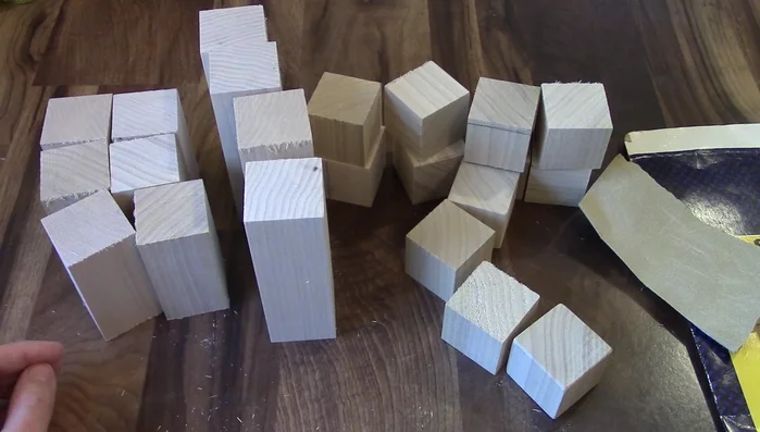 Cut the blocks using a saw and carpenter's square for precise 90° angles.